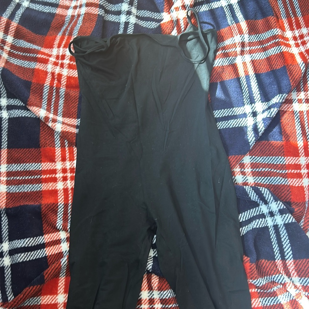 Black body suit in a size small never worn in very good condition
